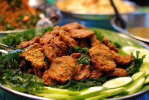 1200px-Thanin_market_tod_man_pla