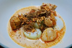 delicious-fried-lontong-with-squid-a-traditional-indonesian-dish